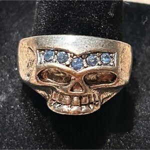 Vintage Silver Tone Skull Ring with Blue Stones. Size 8.5​
